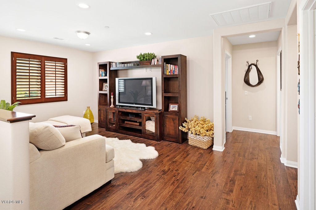4805 Edenbridge Road Moorpark, CA 93021 - Photo 22 of 44 a living room with furniture and a flat screen tv
