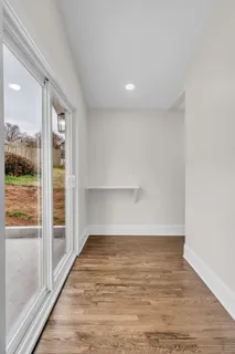 a view of an empty room and window