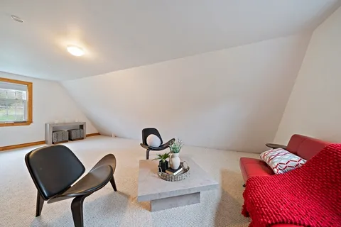 a bedroom with furniture and a couch