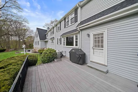 a view of outdoor sitting area with furniture and garden