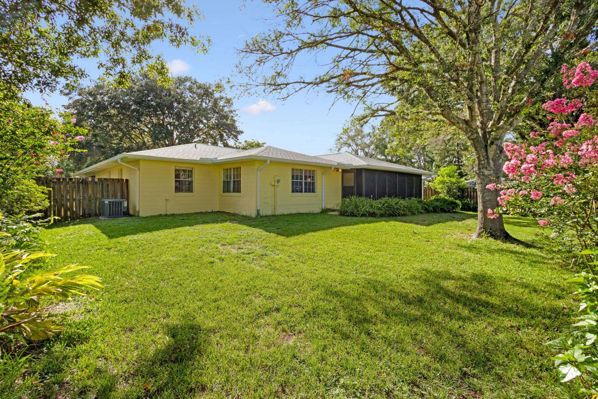 1004 San Remo Road St. Augustine, FL 32086 - Photo 54 of 76 a view of a house with a yard