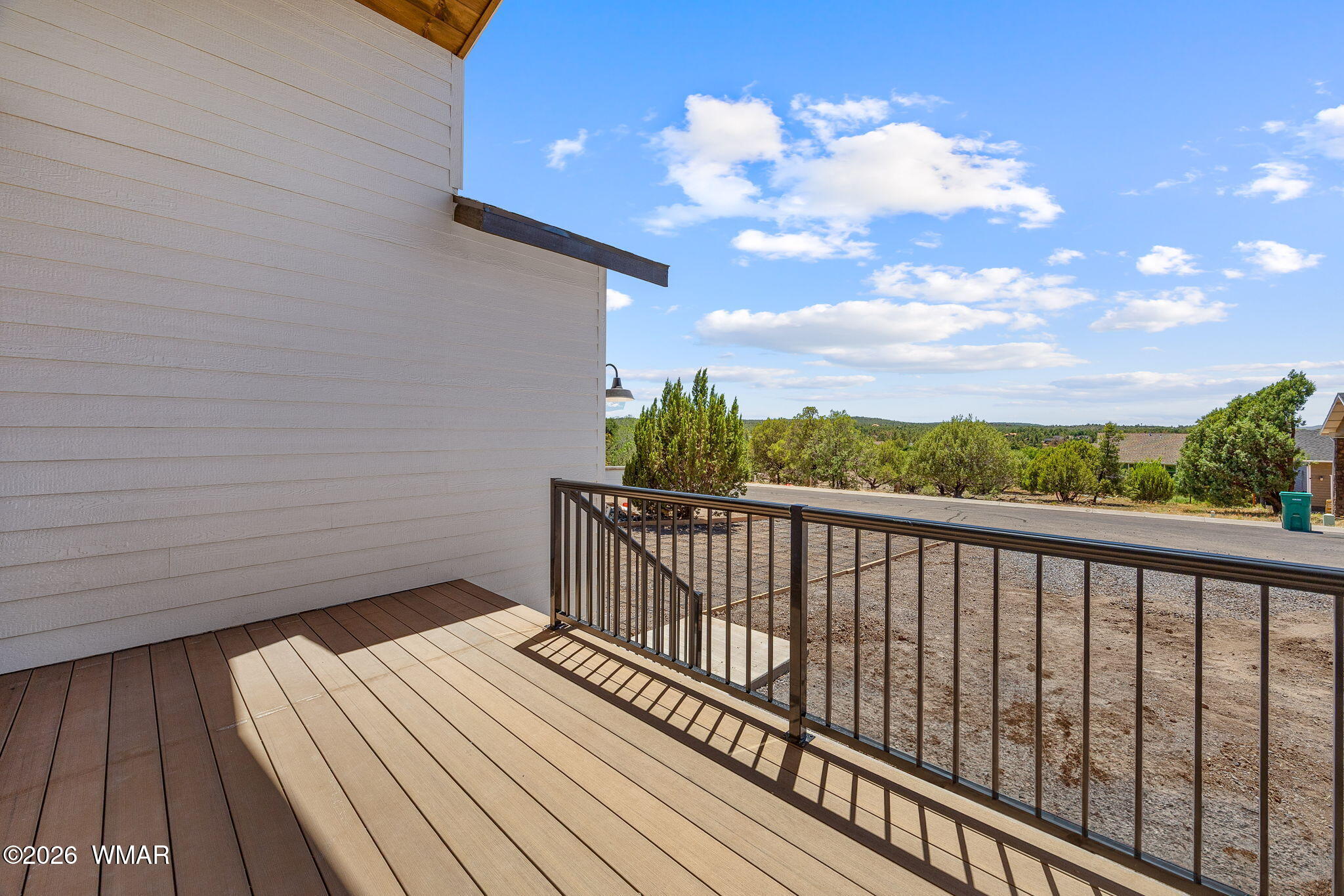 561 South Rock Ridge Drive Show Low, AZ 85901 - Photo 26 of 28 a view of balcony with wooden floor