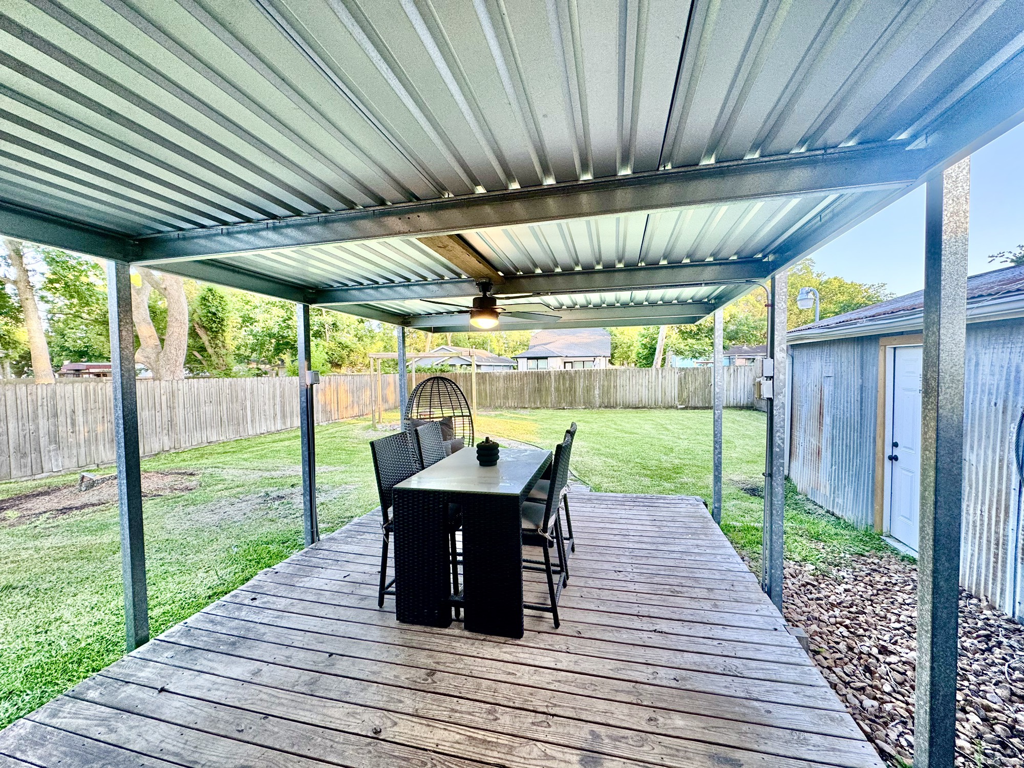 11837 13th Street Santa Fe, TX 77510 - Photo 16 of 20 a view of a patio with wooden floor