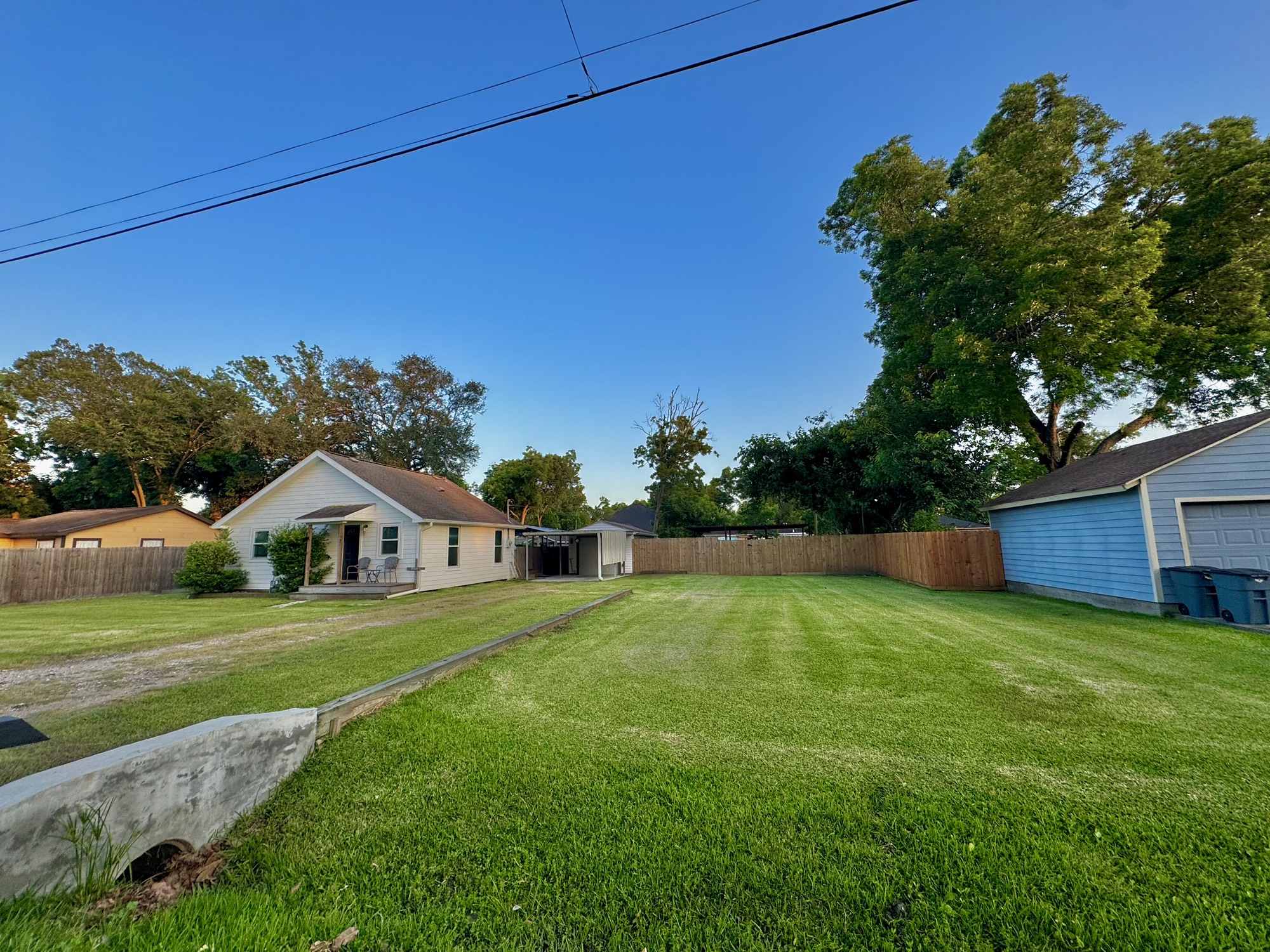 11837 13th Street Santa Fe, TX 77510 - Photo 20 of 20 a view of an house with a big yard