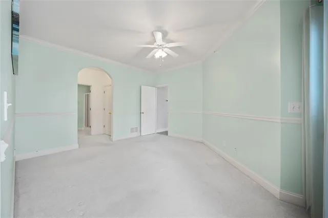a bathroom with a toilet a sink and a mirror