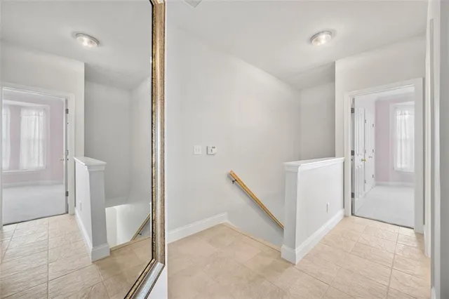 a bathroom with a double vanity sink mirror and shower
