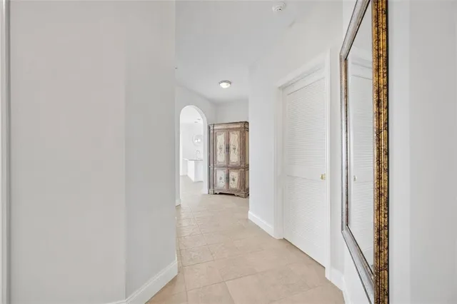a kitchen with stainless steel appliances granite countertop a refrigerator sink and stove