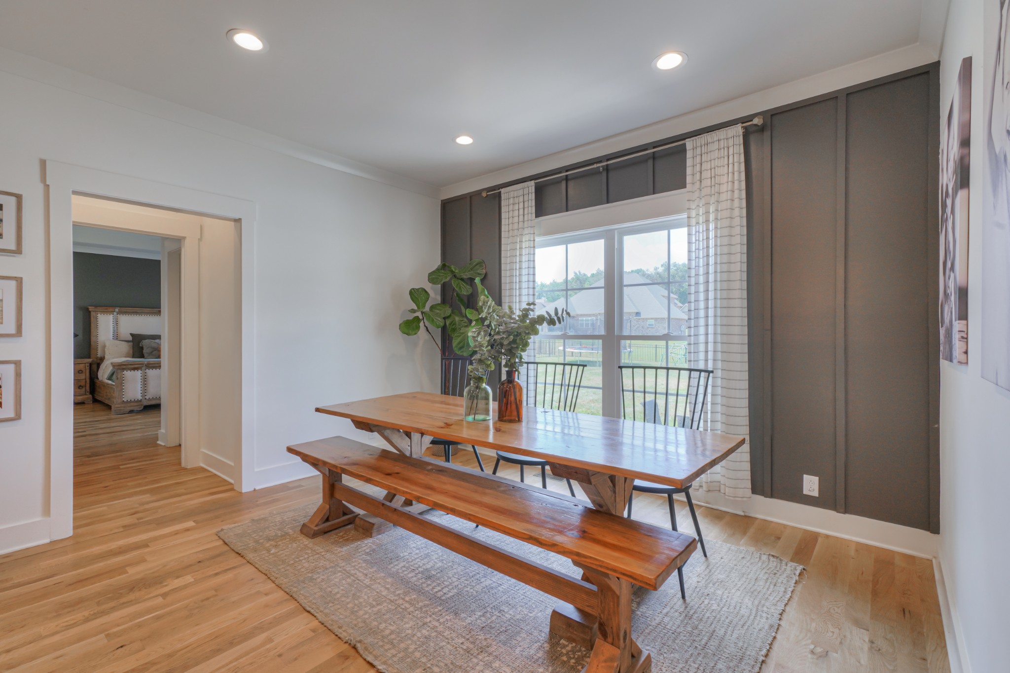 7774 Santos Drive Murfreesboro, TN 37129 - Photo 13 of 42 a living room with furniture and a potted plant