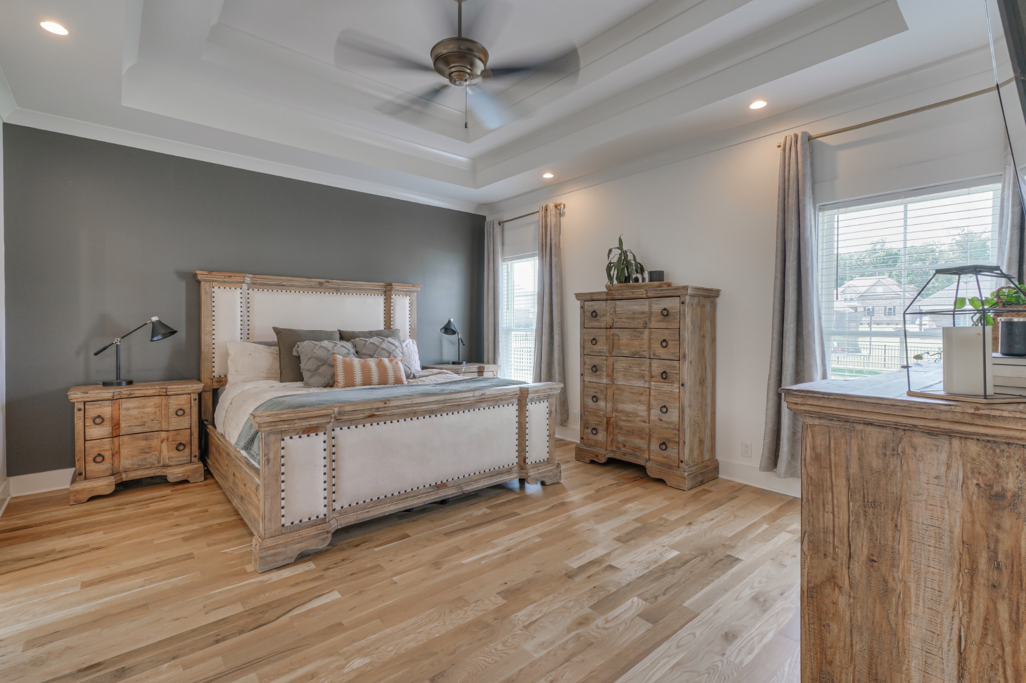 7774 Santos Drive Murfreesboro, TN 37129 - Photo 17 of 42 a bedroom with a bed and wooden floor