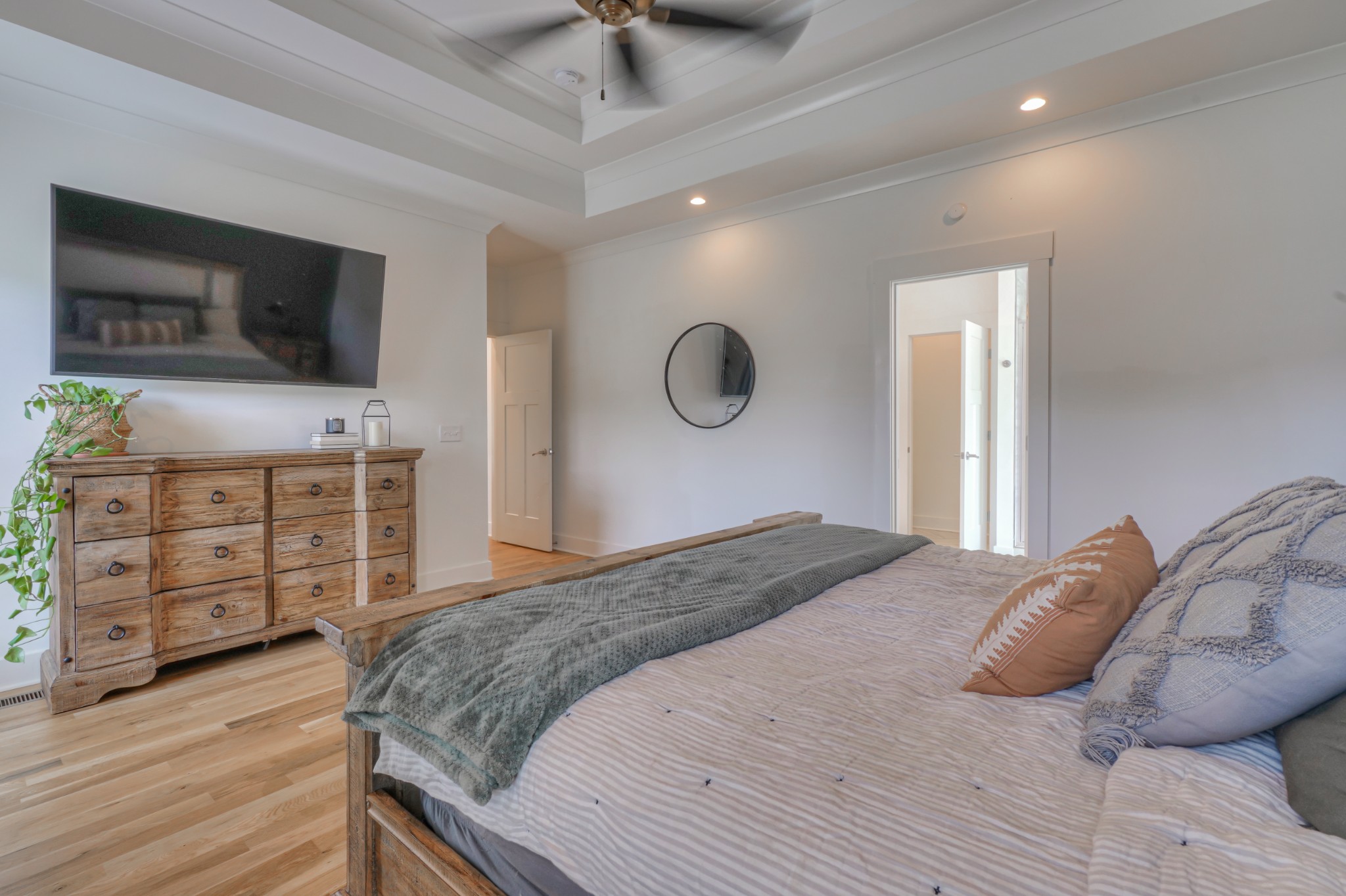 7774 Santos Drive Murfreesboro, TN 37129 - Photo 18 of 42 a bedroom with a large bed and flat tv