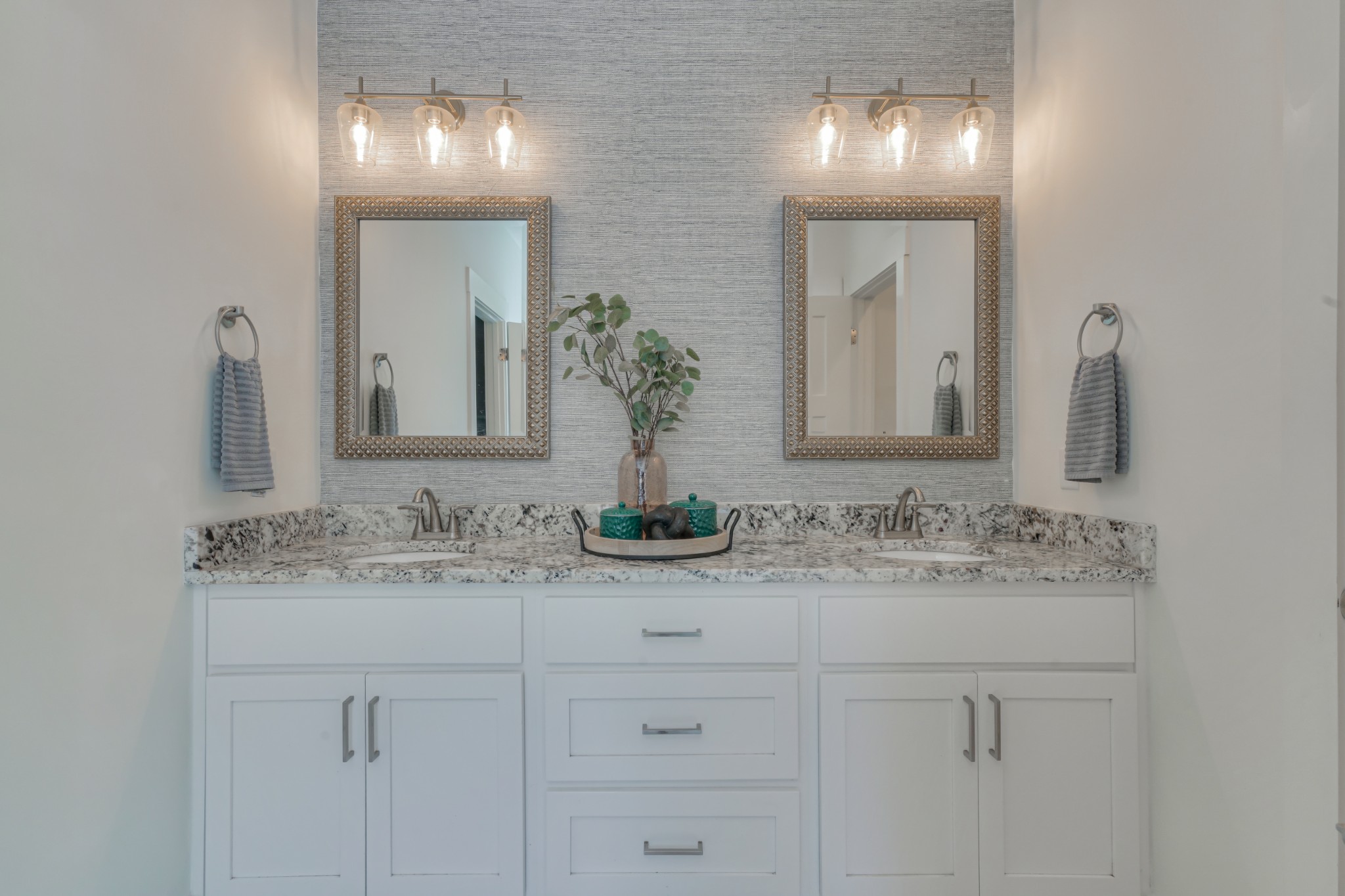 7774 Santos Drive Murfreesboro, TN 37129 - Photo 21 of 42 a bathroom with double sink and a mirror