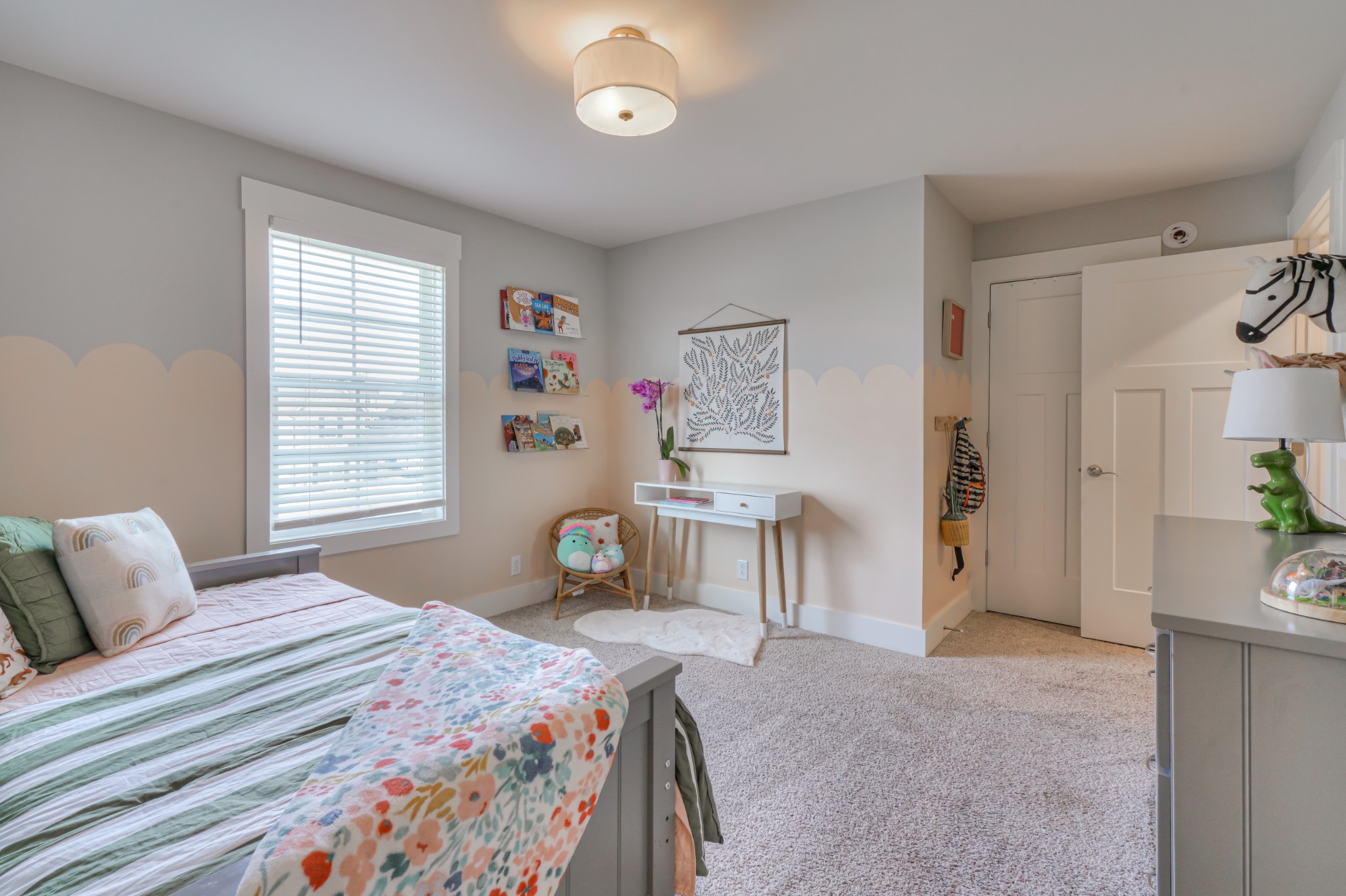 7774 Santos Drive Murfreesboro, TN 37129 - Photo 30 of 42 a bedroom with a bed and a table in it