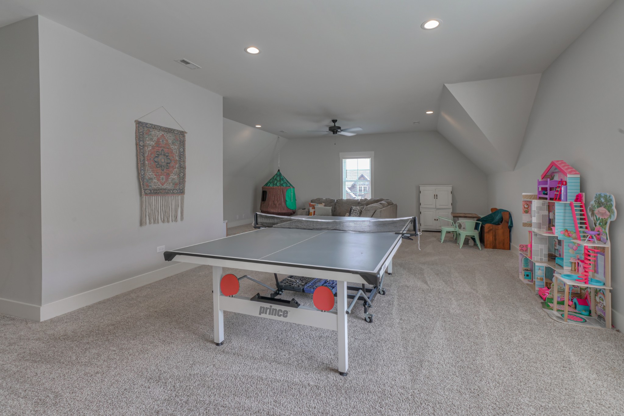 7774 Santos Drive Murfreesboro, TN 37129 - Photo 36 of 42 a living room with game table