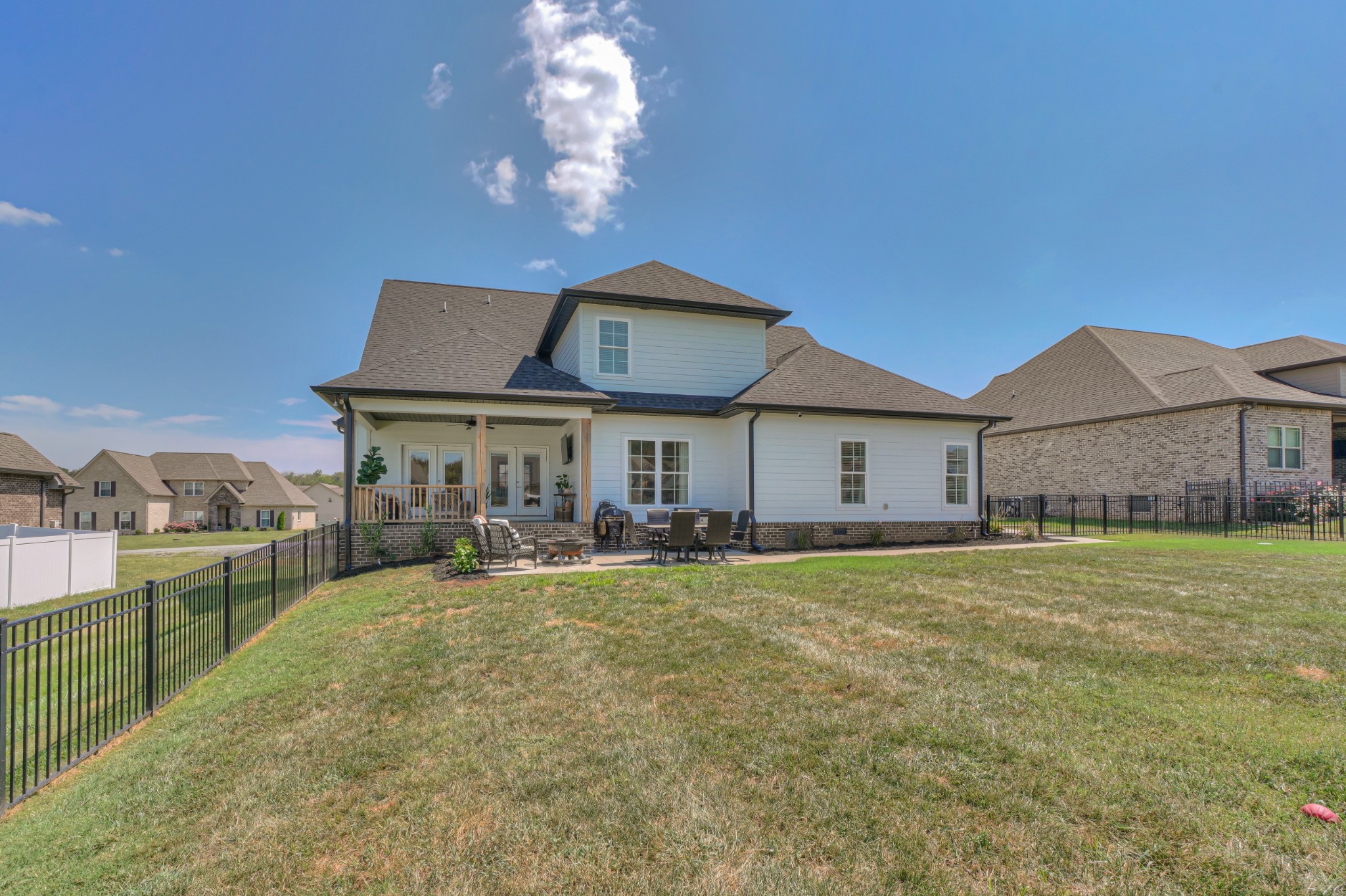 7774 Santos Drive Murfreesboro, TN 37129 - Photo 38 of 42 a view of a house with a yard porch and sitting area