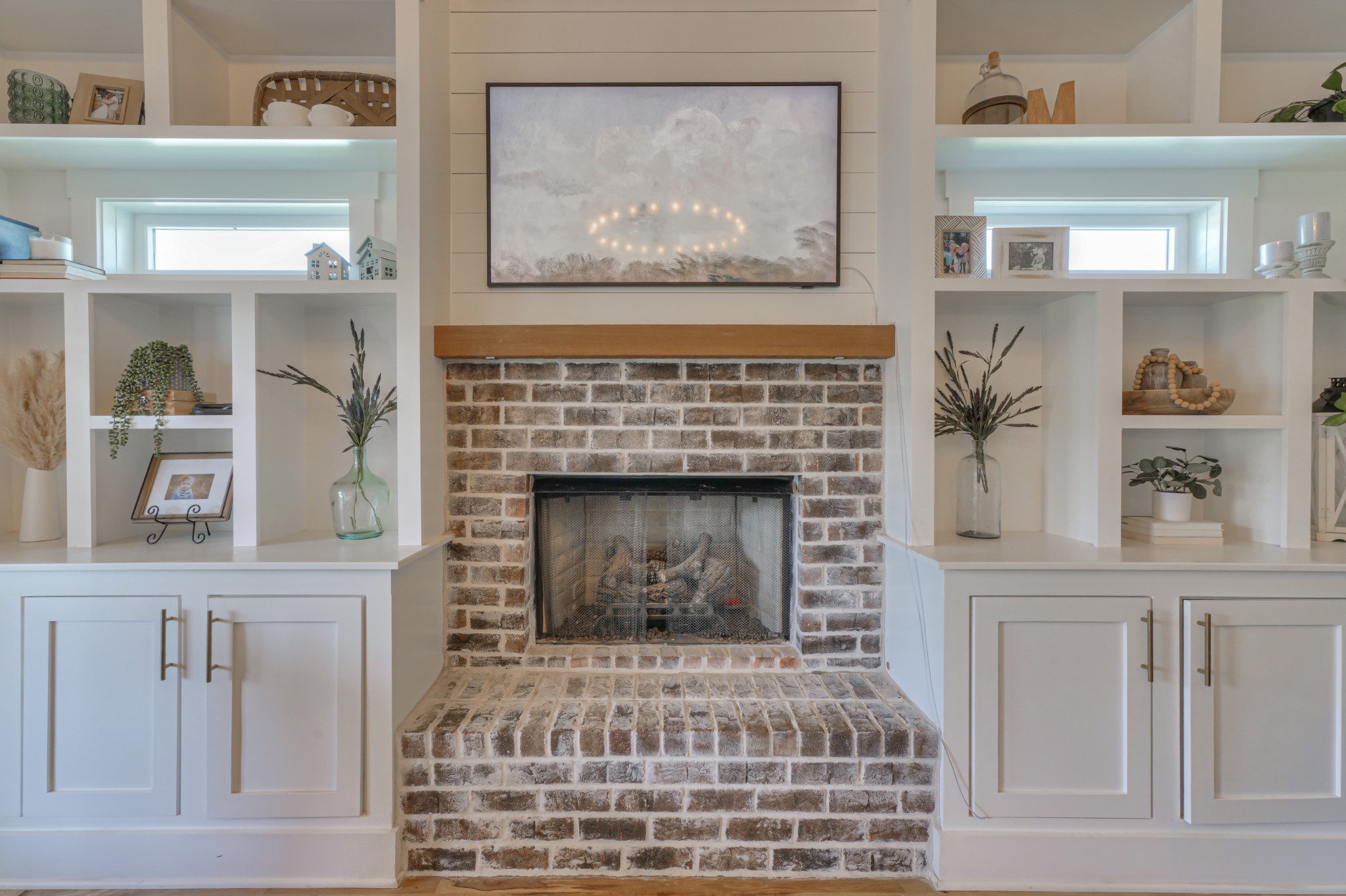 7774 Santos Drive Murfreesboro, TN 37129 - Photo 7 of 42 a living room with furniture and a fireplace