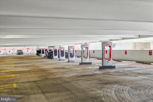 a view of a city street lined with buildings and trees