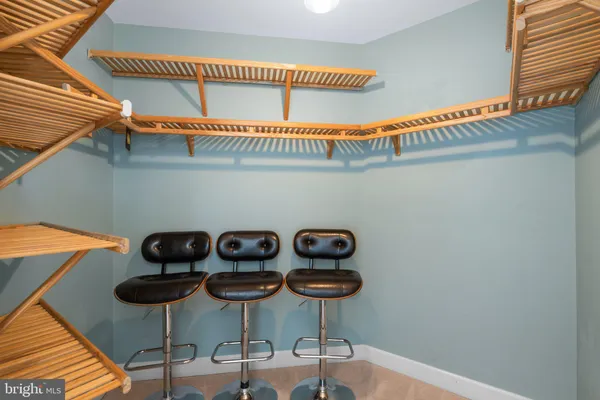 a bathroom with a tub a sink and a shower