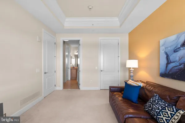 a bathroom with a sink a mirror and a shower