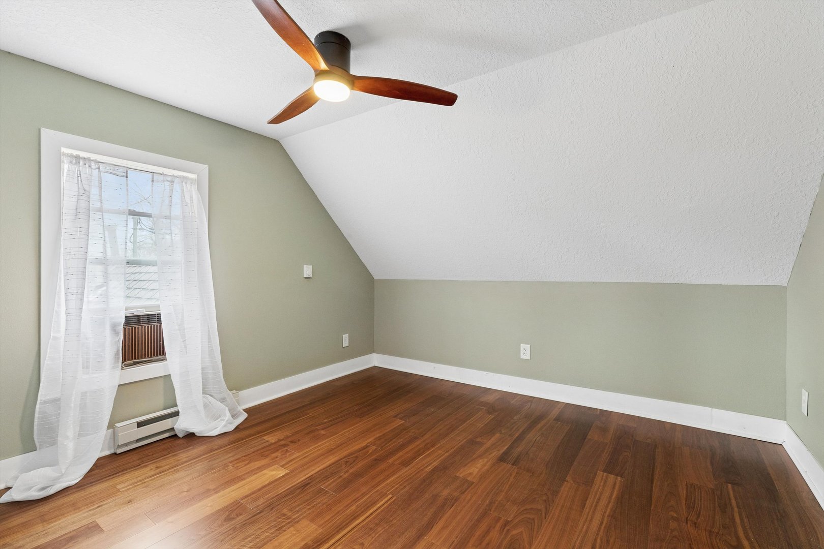 211 Clay Street New Boston, IL 61272 - Photo 24 of 29 an empty room with wooden floor and windows