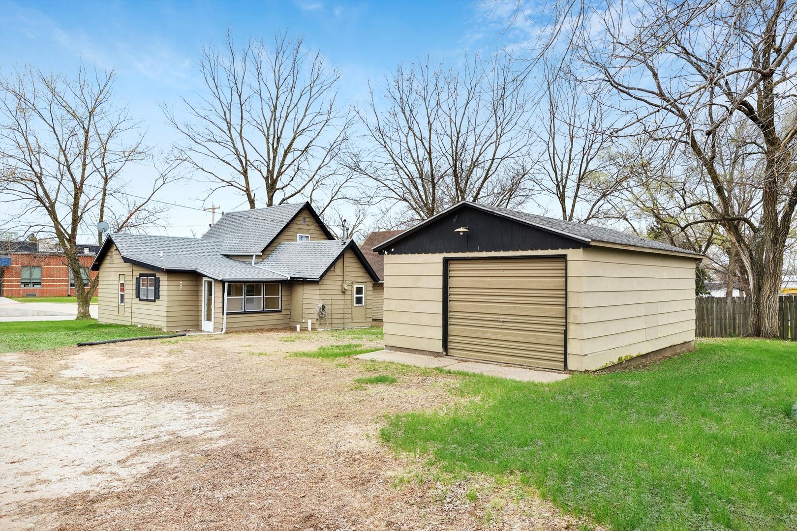 211 Clay Street New Boston, IL 61272 - Photo 27 of 29 a front view of a house with a yard