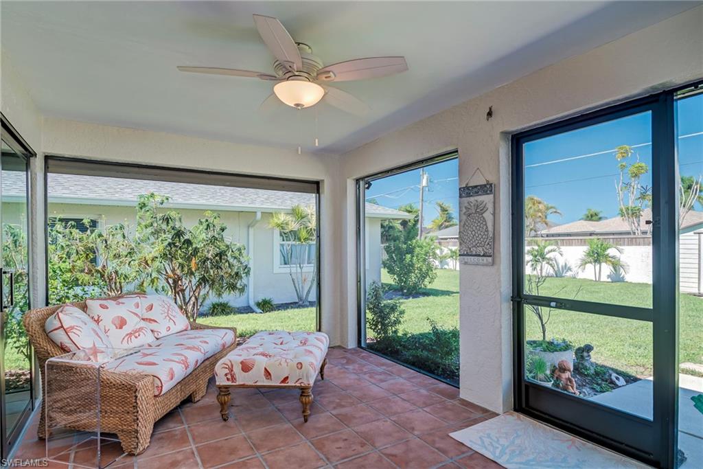 577 98th Avenue North Naples, FL 34108 - Photo 19 of 33 a room with furniture and a large window