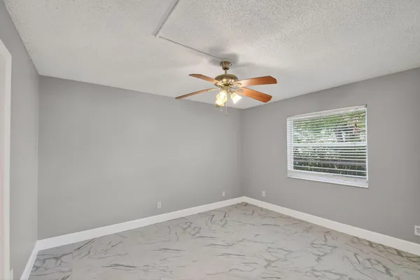 an empty room with a window