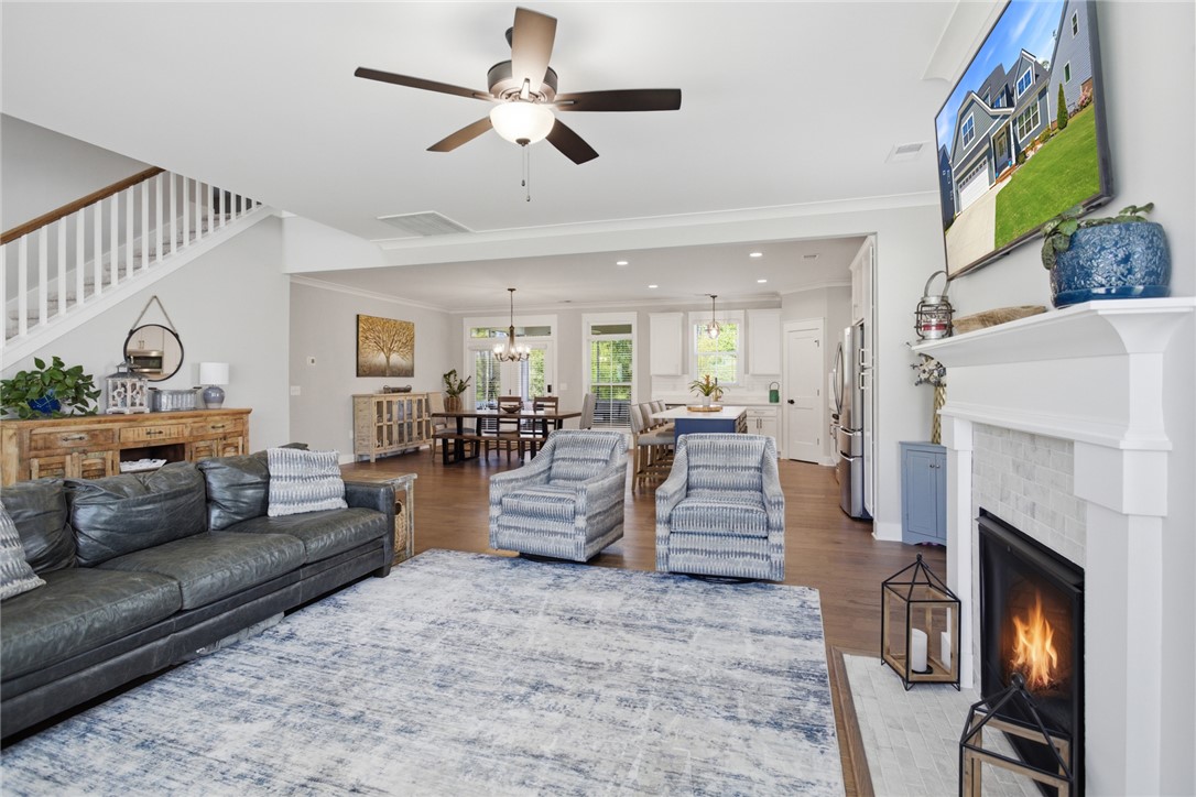 318 Summerall Drive Anderson, SC 29621 - Photo 6 of 42 This inviting space combines comfort and contemporary design, perfect for everyday living and entertaining.