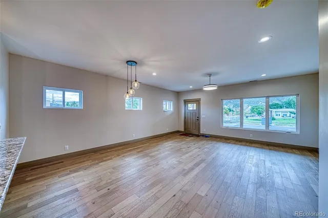 a view of kitchen and windows