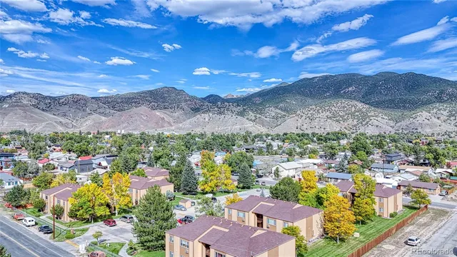 a view of parking with a glass building