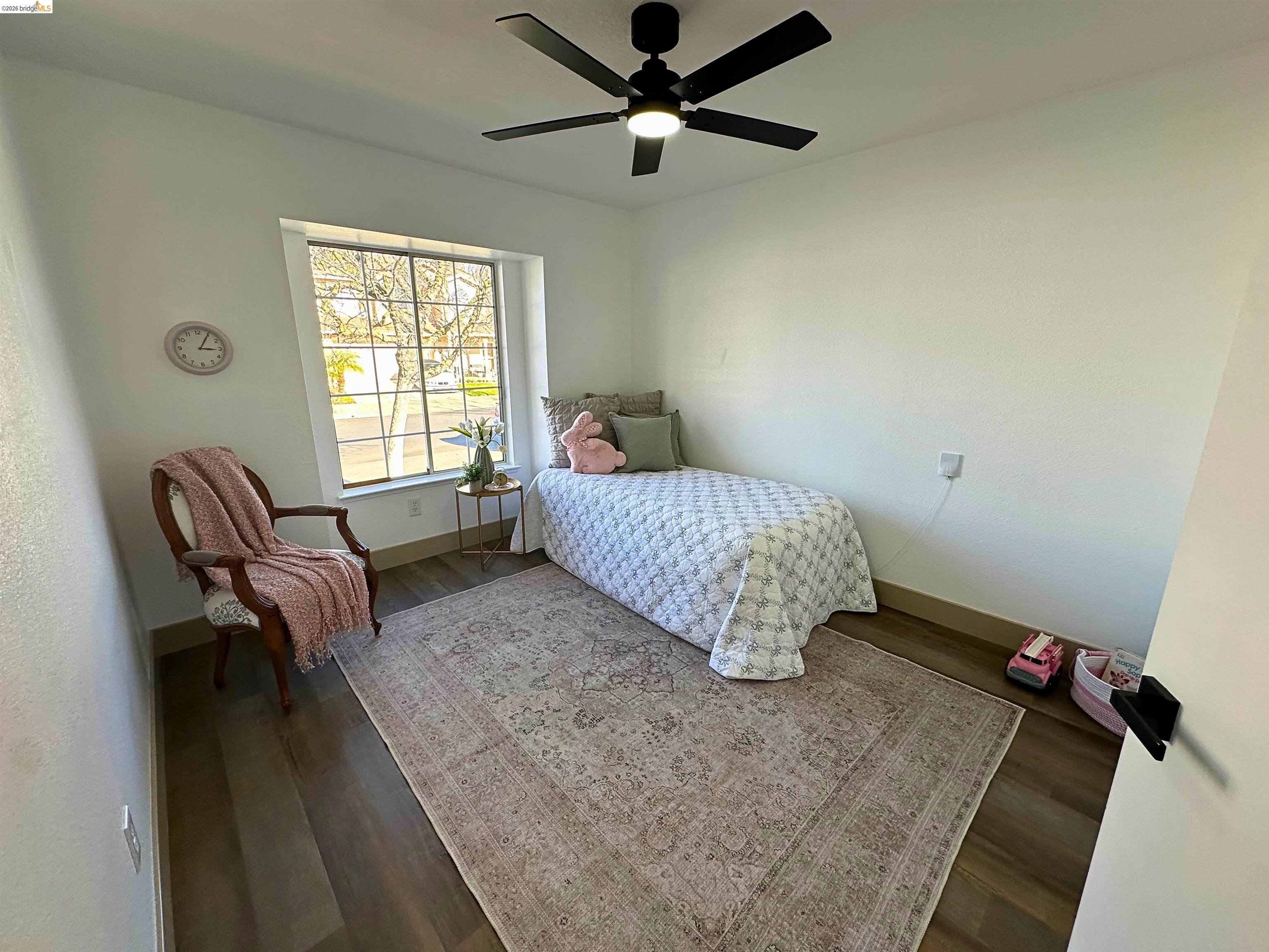 3075 Shiles Loop Brentwood, CA 94513 - Photo 12 of 37 Bedroom with wood finished floors and ceiling fan