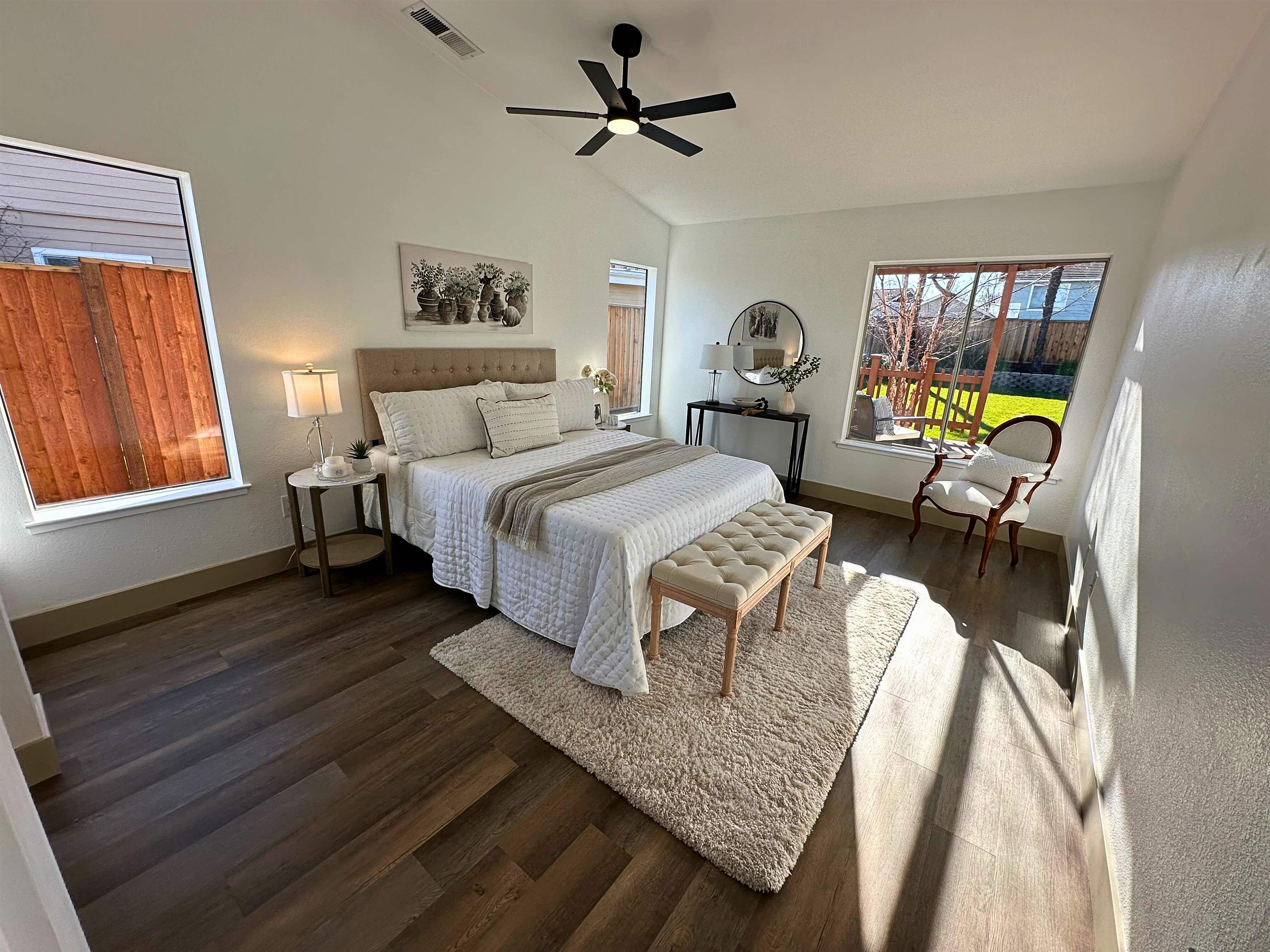 3075 Shiles Loop Brentwood, CA 94513 - Photo 20 of 37 a bed room with a bed and a chandelier