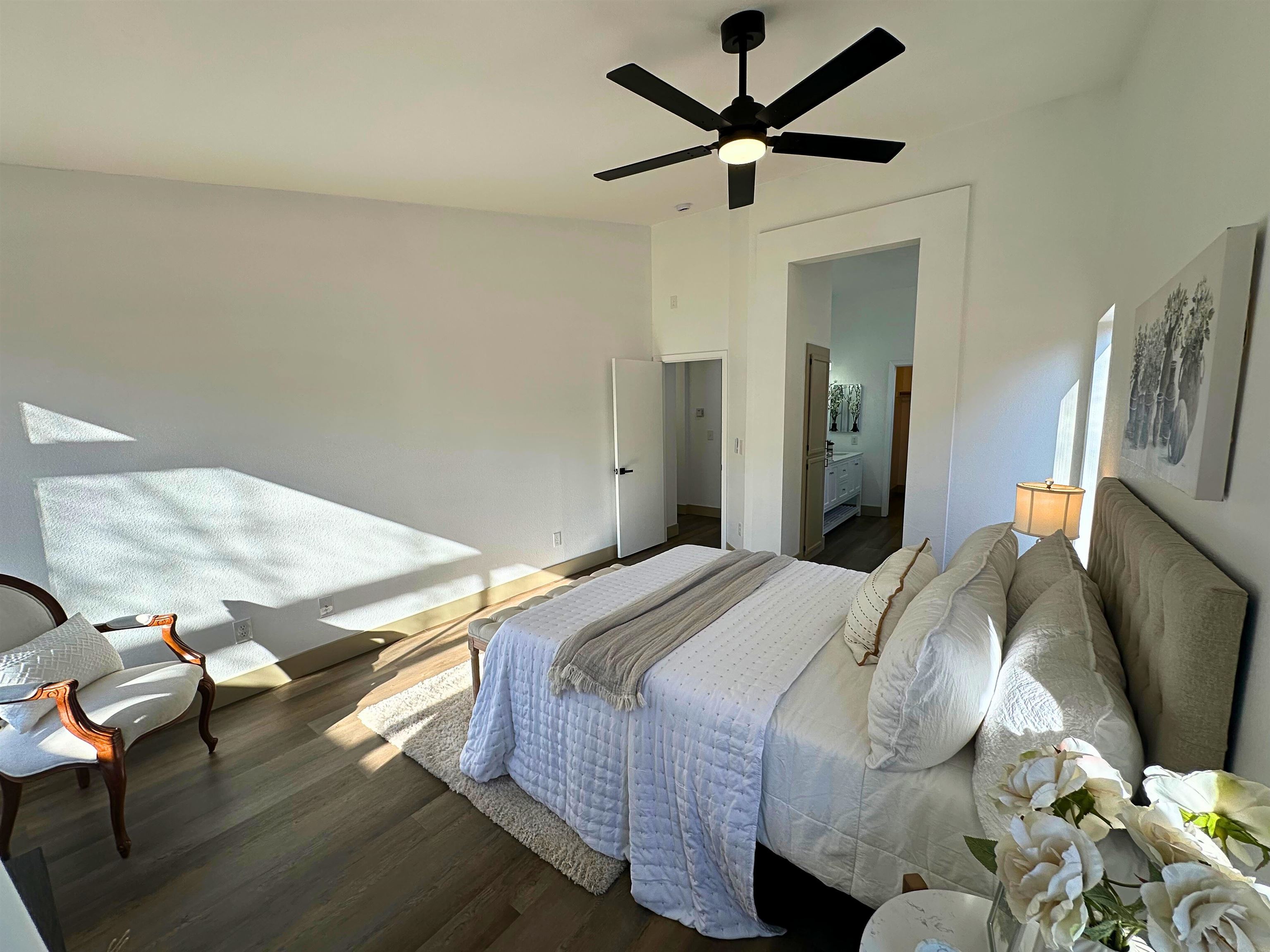 3075 Shiles Loop Brentwood, CA 94513 - Photo 21 of 37 a bedroom with a bed and a chandelier