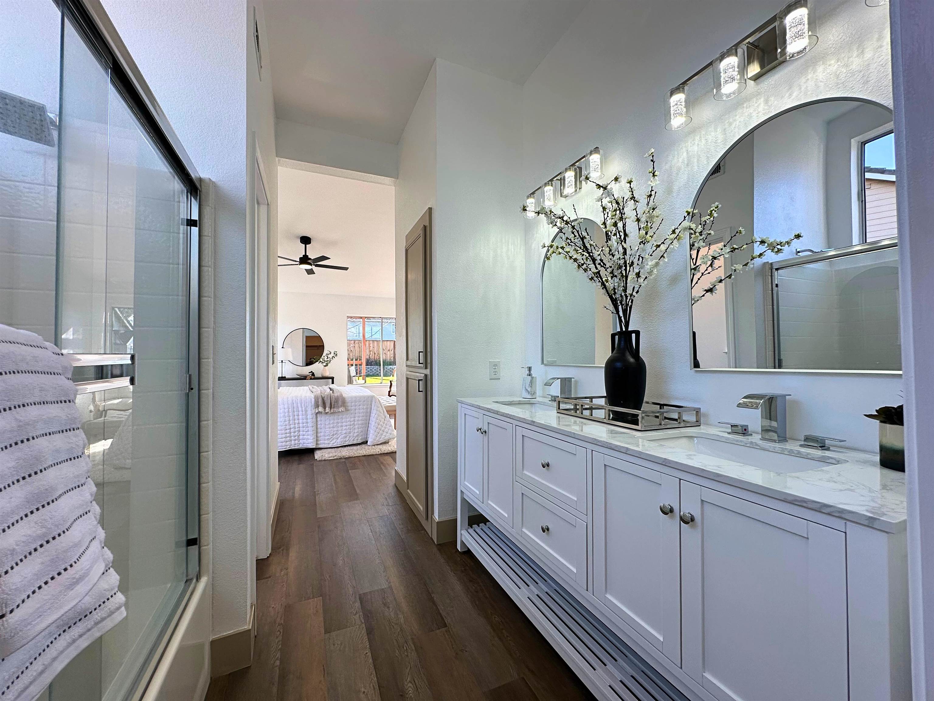 3075 Shiles Loop Brentwood, CA 94513 - Photo 24 of 37 a spacious bathroom with a double vanity sink and a mirror