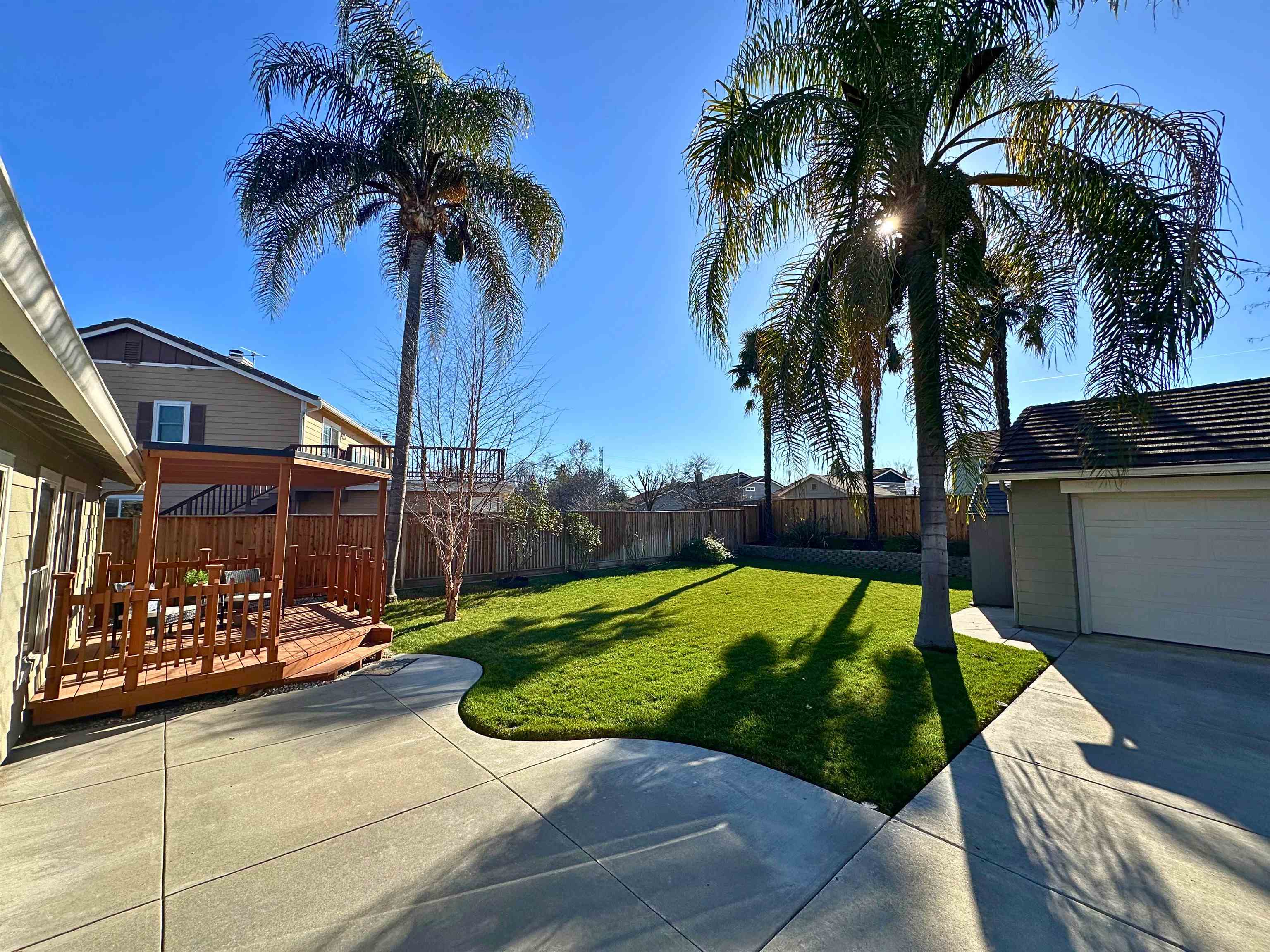 3075 Shiles Loop Brentwood, CA 94513 - Photo 35 of 37 a view of a backyard with palm trees