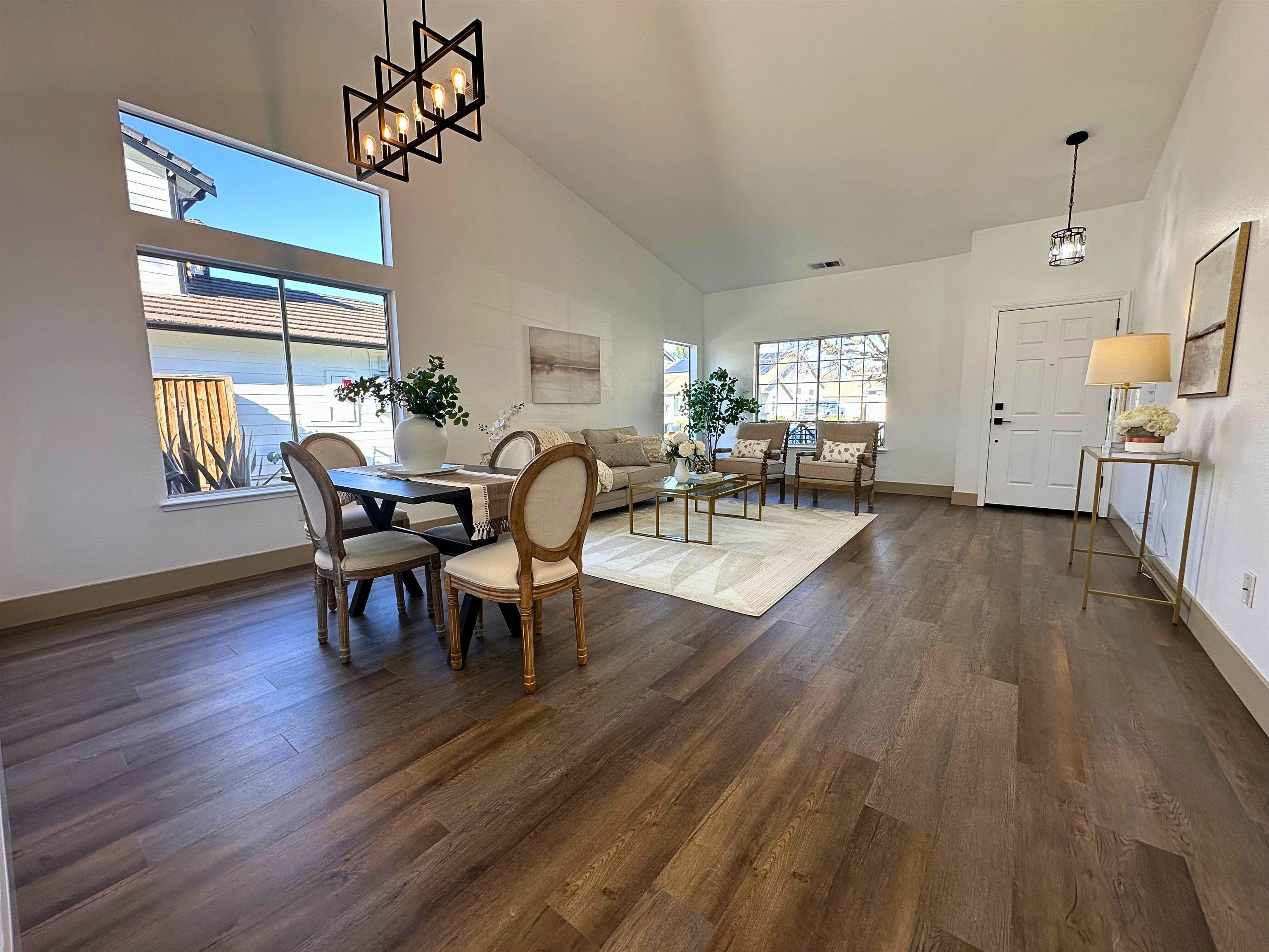 3075 Shiles Loop Brentwood, CA 94513 - Photo 5 of 37 a view of a dining room with furniture window and wooden floor