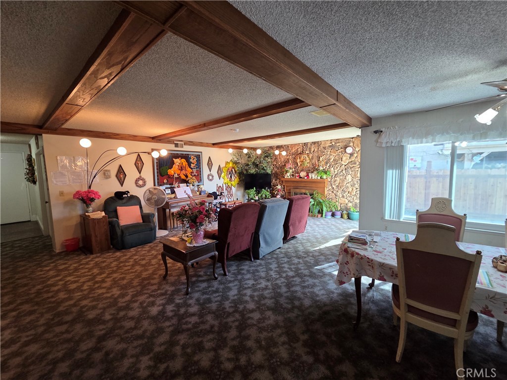 44047 Rodin Avenue Lancaster, CA 93535 - Photo 12 of 26 a view of a dining room with furniture water view and mountain view