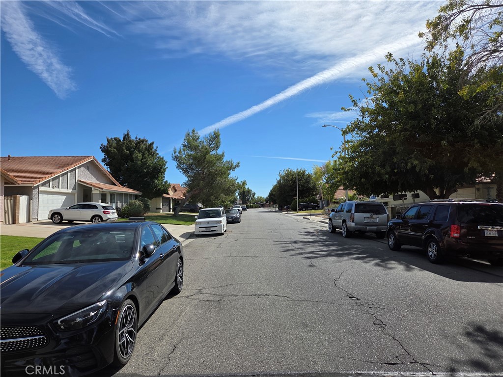 44047 Rodin Avenue Lancaster, CA 93535 - Photo 26 of 26 a car parked on the side of a road
