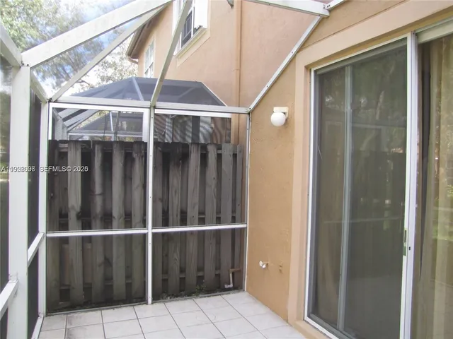 a view of outdoor space with deck and window