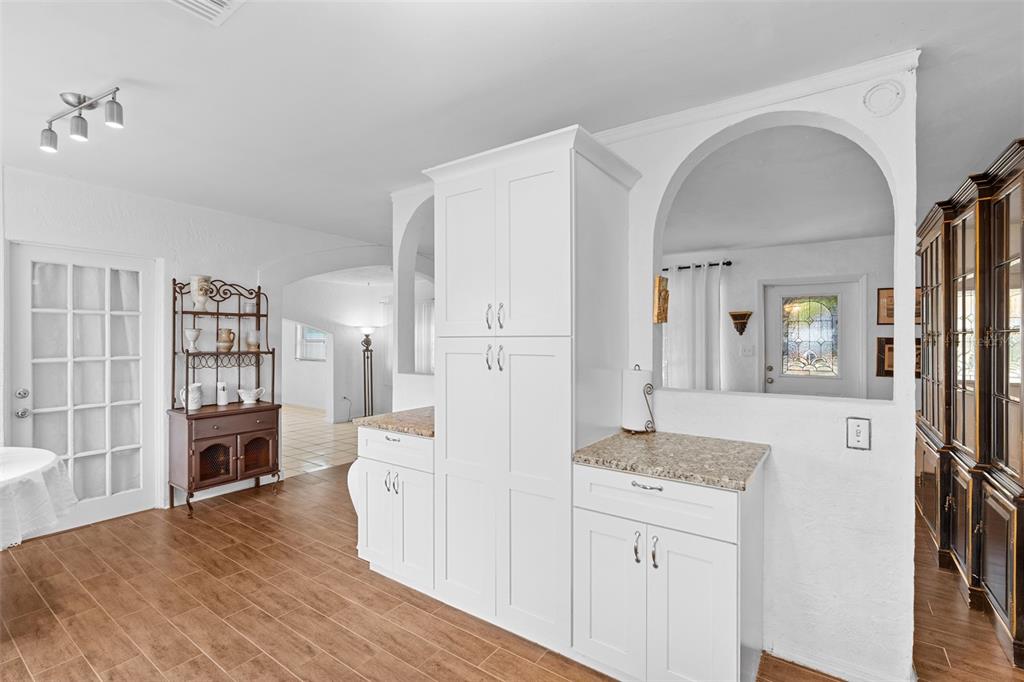 755 43rd Street St. Petersburg, FL 33713 - Photo 13 of 46 a living room with furniture and a kitchen view