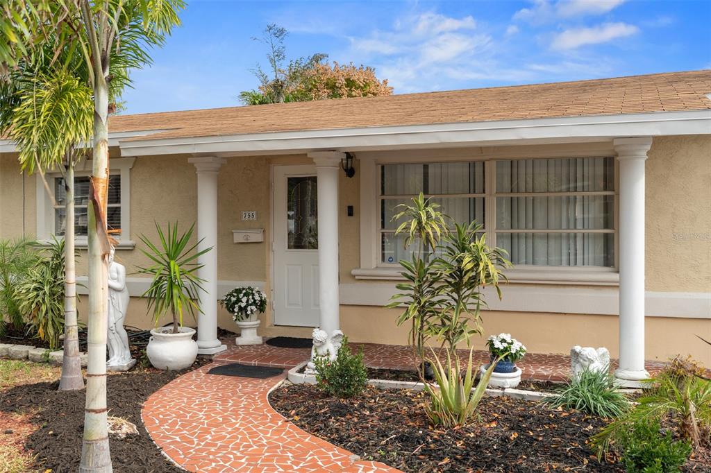 755 43rd Street St. Petersburg, FL 33713 - Photo 3 of 46 a view of a house with potted plants