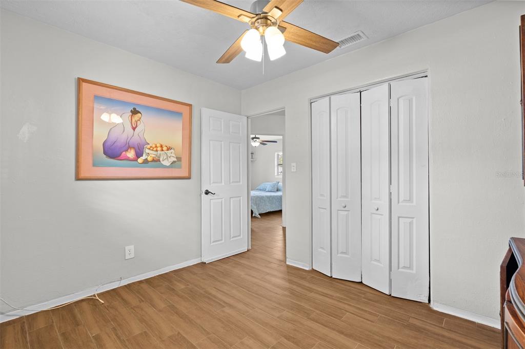 755 43rd Street St. Petersburg, FL 33713 - Photo 33 of 46 wooden floor in an empty room with a window
