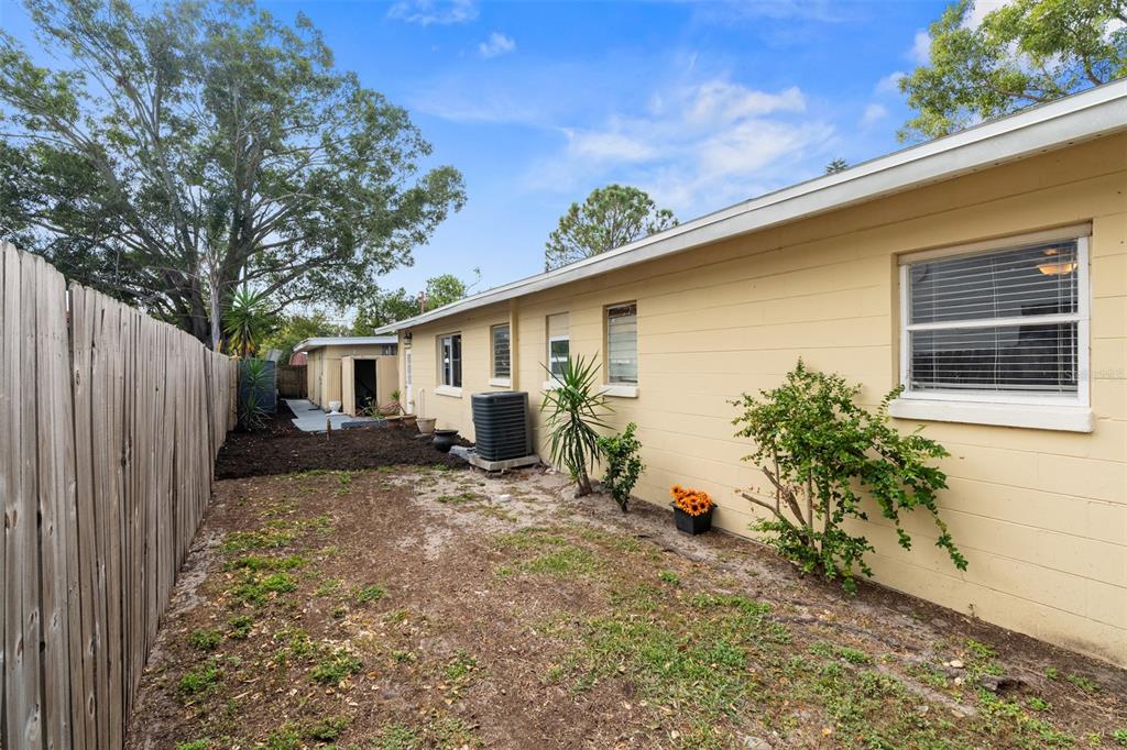 755 43rd Street St. Petersburg, FL 33713 - Photo 34 of 46 a backyard of a house with table and chairs