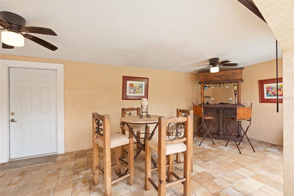755 43rd Street St. Petersburg, FL 33713 - Photo 37 of 46 a view of a dining room with furniture and chandelier