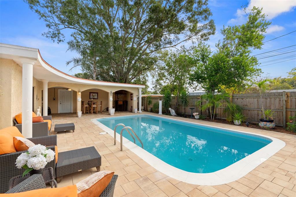 755 43rd Street St. Petersburg, FL 33713 - Photo 42 of 46 a view of a house with swimming pool in front of it