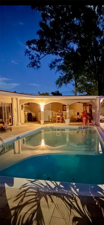 755 43rd Street St. Petersburg, FL 33713 - Photo 43 of 46 a view of swimming pool with a yard