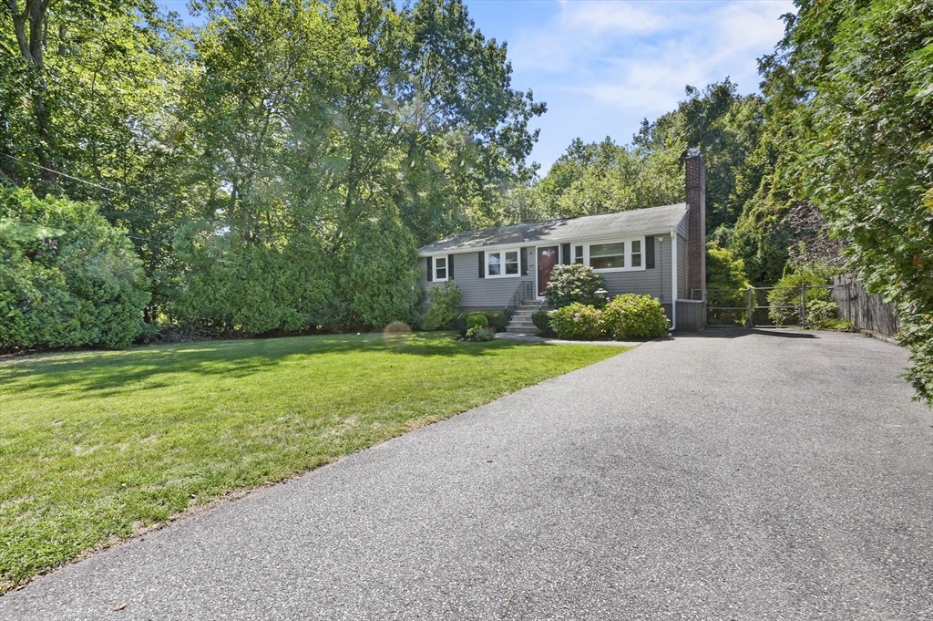 180 Hardy Pond Road Waltham, MA 02451 - Photo 30 of 31 a front view of house with yard and green space