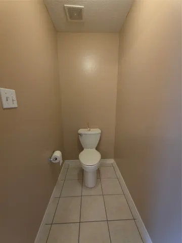 a bathroom with a toilet