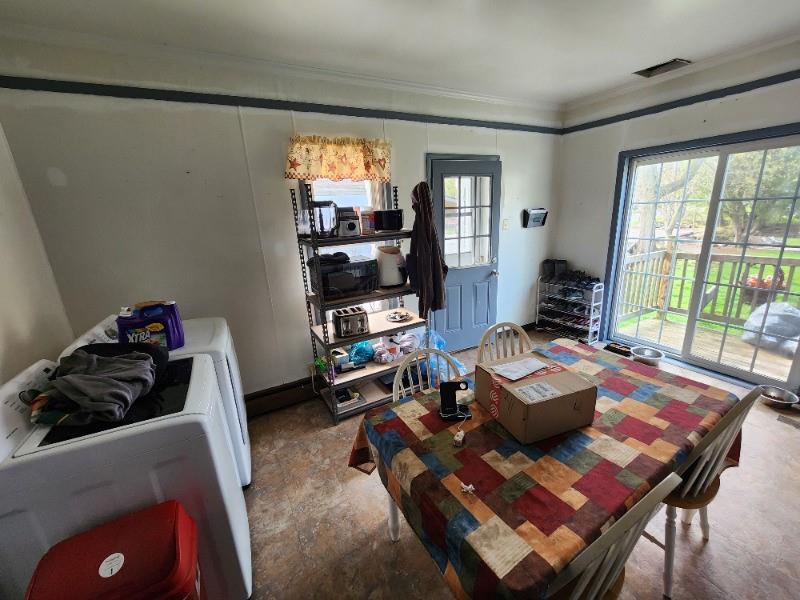 99 Main Street Grampian, PA 16838 - Photo 6 of 14 a living room with furniture and a flat screen tv
