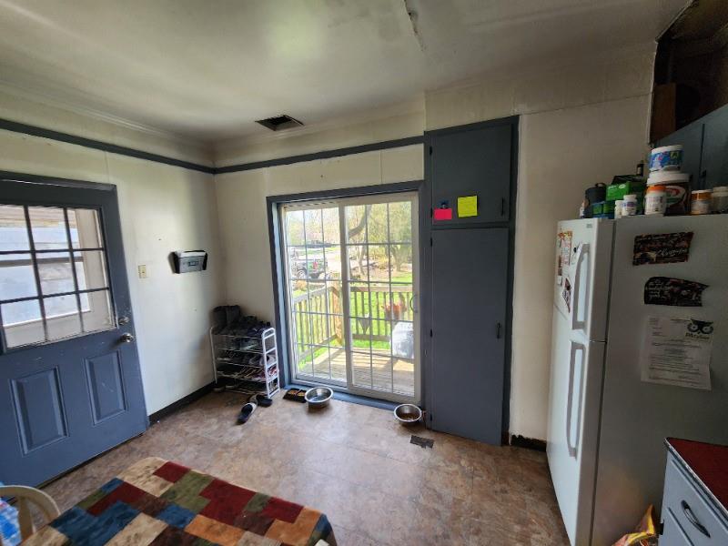 99 Main Street Grampian, PA 16838 - Photo 7 of 14 a view of an empty room with a window