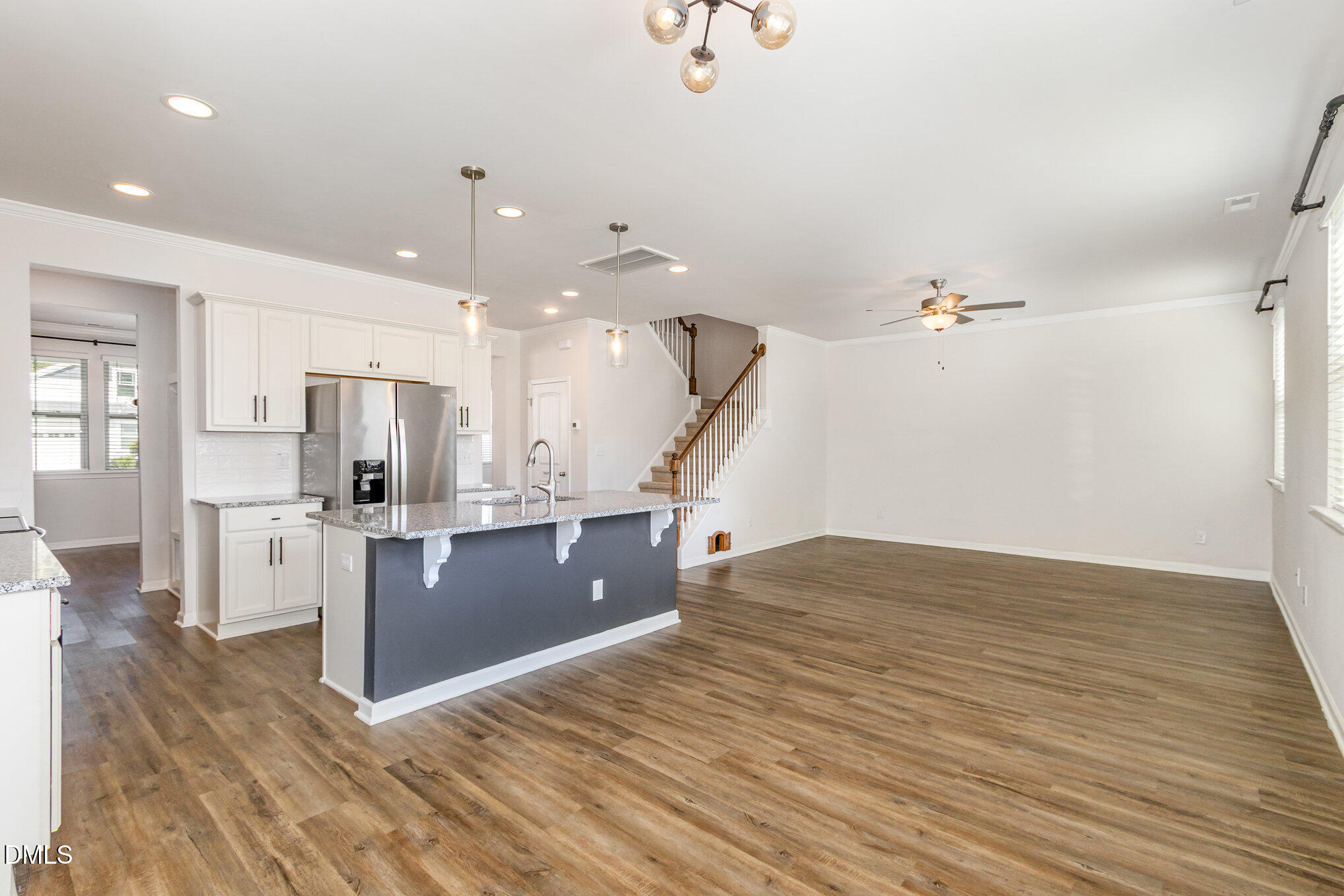 39 Calabor Court Fuquay-Varina, NC 27526 - Photo 15 of 40 a view of kitchen and center island in it